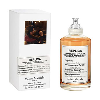 Perfume Jazz Club da Maison Margiela com frasco âmbar em ambiente sofisticado