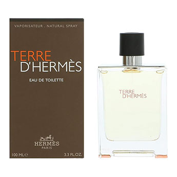 Frasco do Terre d’Hermès com fundo que remete à natureza.